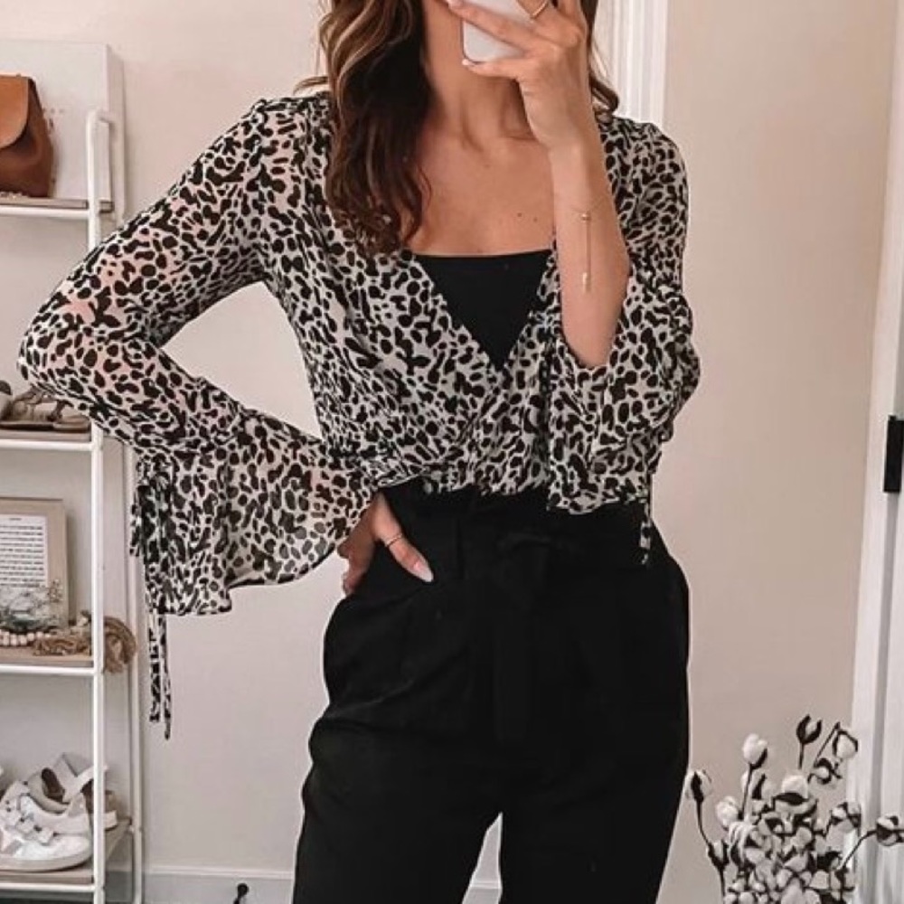 Brand new super cute printed blouse/cover up.